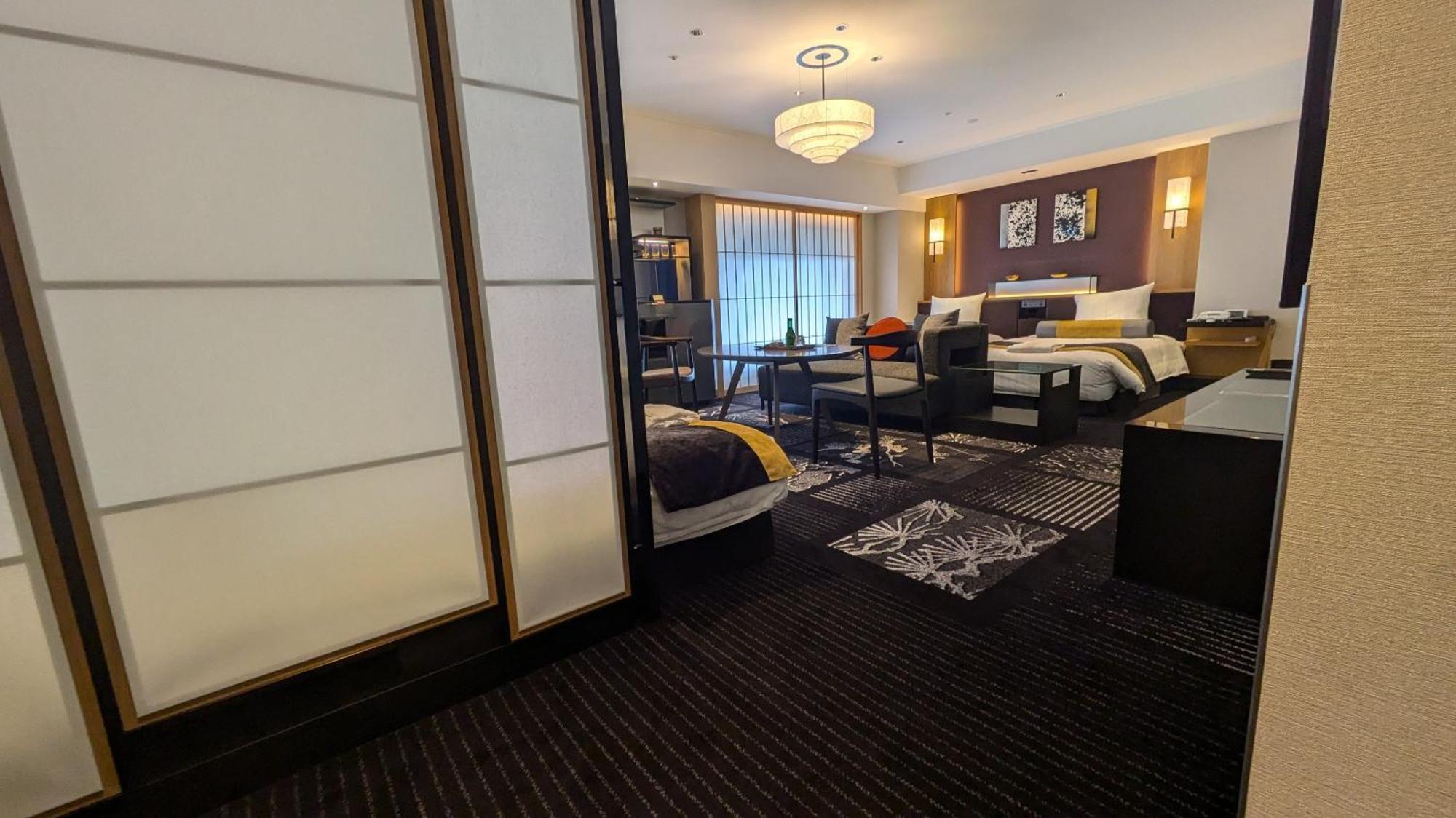 Hotel New Otani Osaka Bagian luar foto A room at the hotel