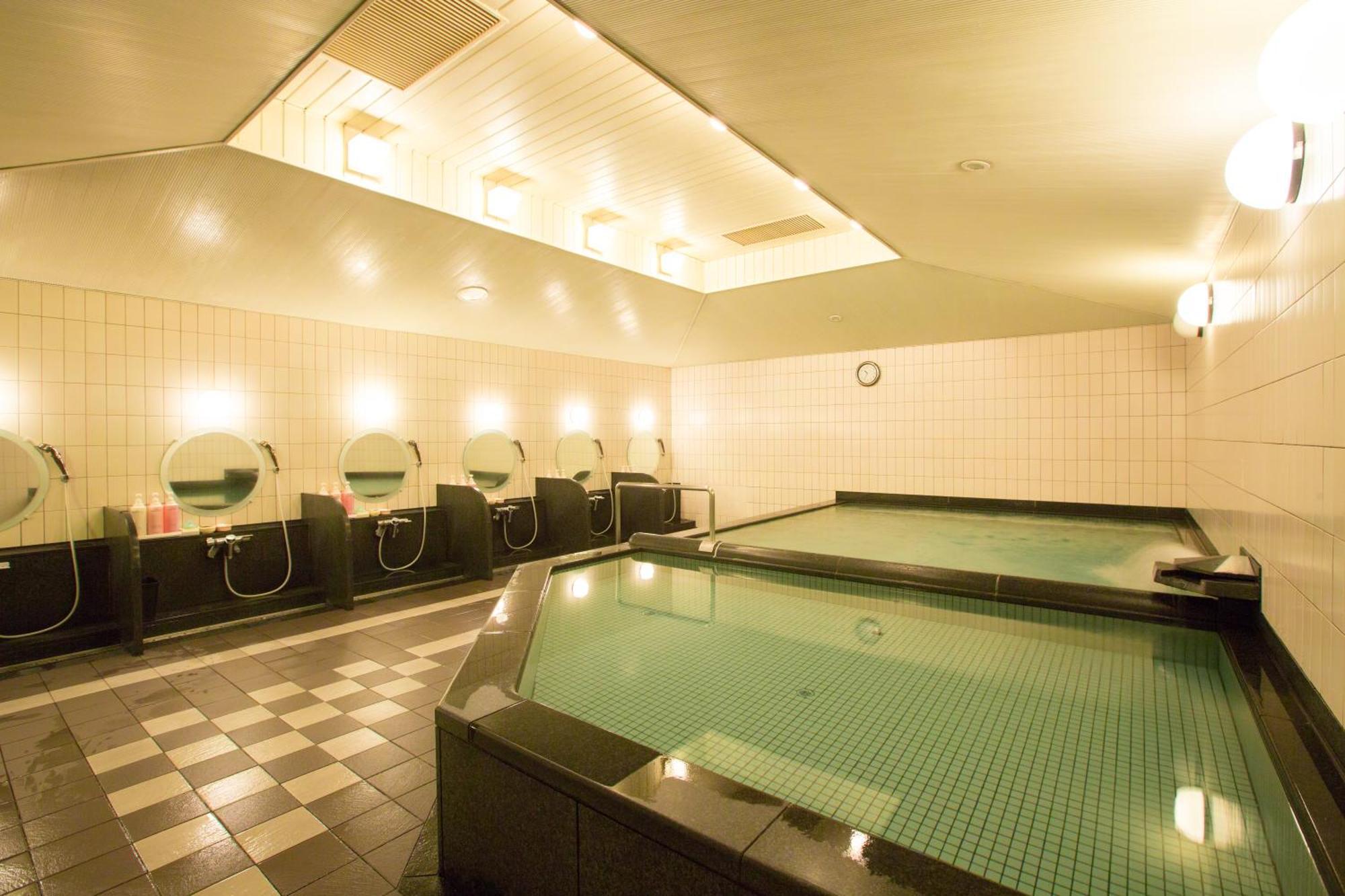 Hotel New Otani Osaka Bagian luar foto A modern onsen